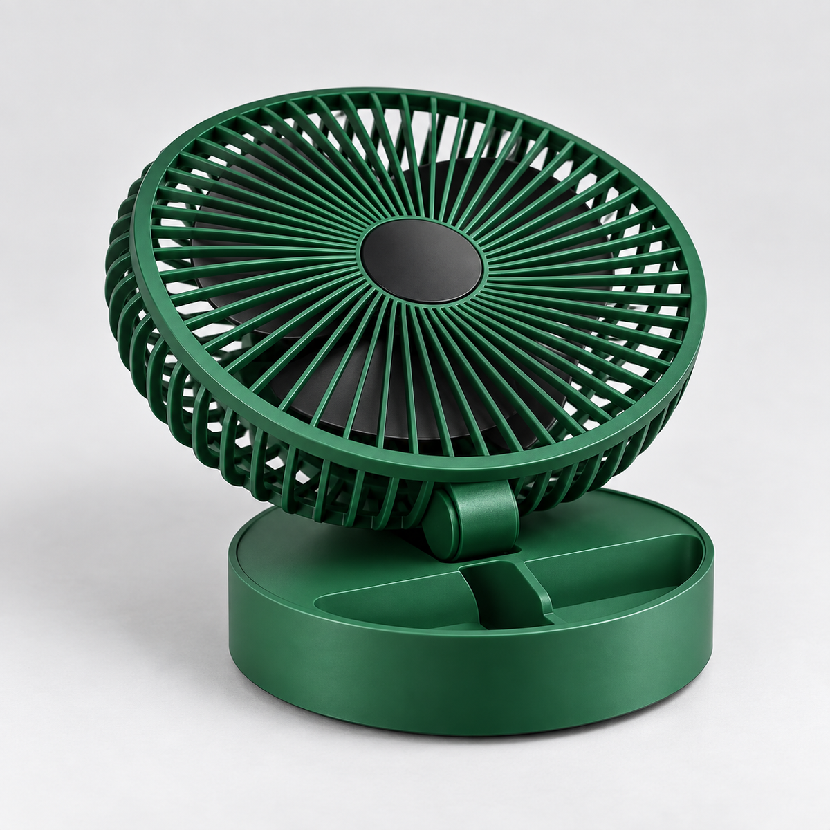 RIO+ green desk fan in its compact folded position