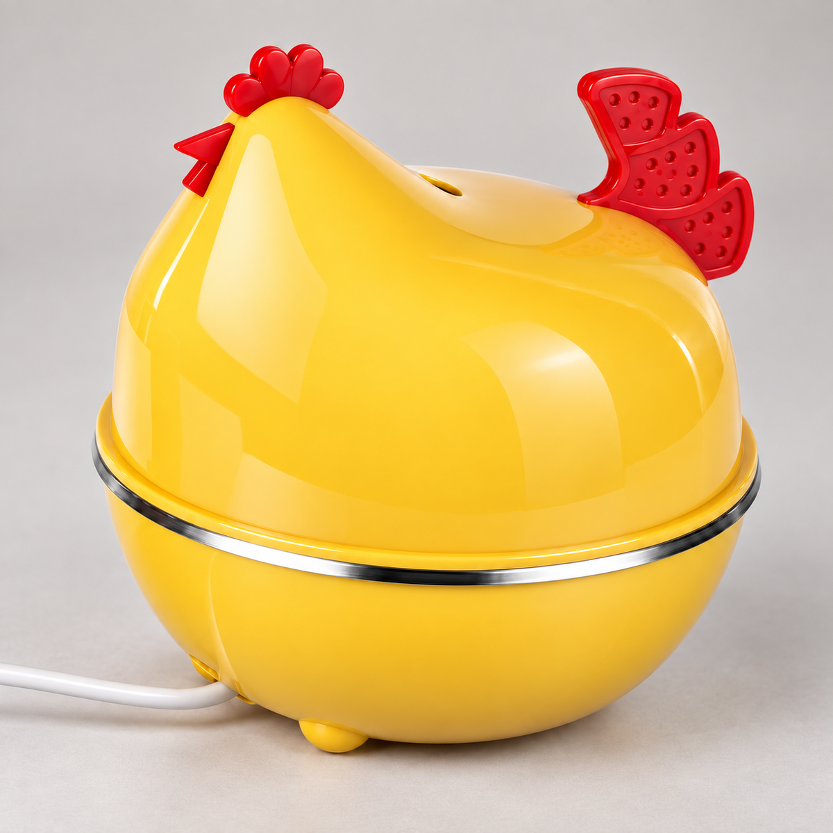 Close view of the RIO+ yellow chicken egg cooker